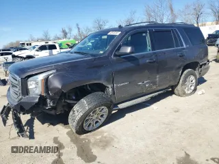 2015 GMC Yukon SLT with VIN 1GKS2BKC8FR232912, listed as a Copart auction lot 46548385 with 221,353 mi miles and Salvage Title. Bid and sale history available at carsss.com. Image 1.