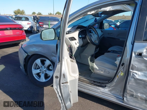 2014 Toyota Sienna LE AAS with VIN 5TDKK3DC7ES435109, listed as a IAAI auction lot 41963135 with 175,517 mi miles and . Bid and sale history available at DreamBid. Image 5.