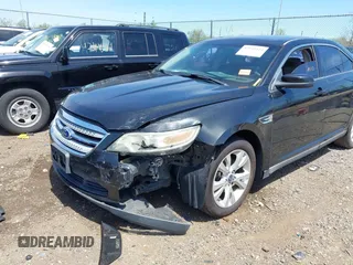 2011 Ford Taurus SEL with VIN 1FAHP2EW6BG127102, listed as a IAAI auction lot 42131123 with 168,965 mi miles. Bid and sale history available at carsss.com. Image 2.