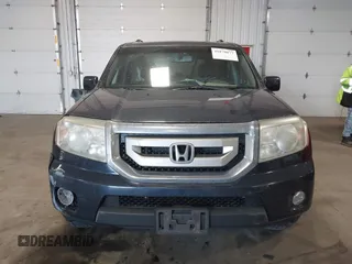 2011 Honda Pilot EX-L with VIN 5FNYF4H54BB043205, listed as a IAAI auction lot 41879077 with 240,108 mi miles. Bid and sale history available at carsss.com. Image 12.