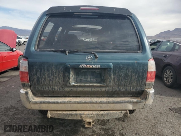 1997 Toyota 4Runner SR5 z VIN JT3HN86R9V0059388, wystawiony jako Copart lot #59231815 z przebiegiem 310 270 mil mil oraz Szkoda całkowita • Salvage title. Historia ofert i sprzedaży dostępna na DreamBid. Obrazek 6.
