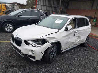 2017 BMW X1 xDrive28i with VIN WBXHT3C36H5F74818, listed as a IAAI auction lot 41853836 with 71,735 mi miles and . Bid and sale history available at DreamBid. Image 20.