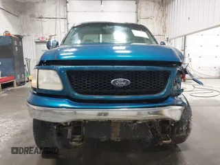 2000 Ford F-150 XL z VIN 1FTRX18L7YKB27657, wystawiony jako IAAI lot #42262373 z przebiegiem Nie podano mil oraz . Historia ofert i sprzedaży dostępna na DreamBid. Obrazek 12.