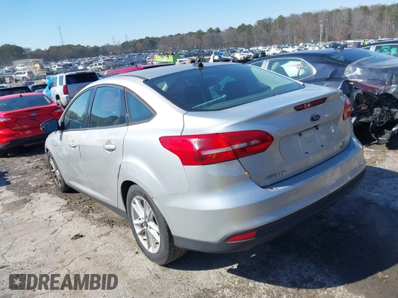 2016 Ford Focus SE with VIN 1FADP3F26GL272588, listed as a IAAI auction lot 41624534 with 149,808 mi miles. Bid and sale history available at carsss.com. Image 3.