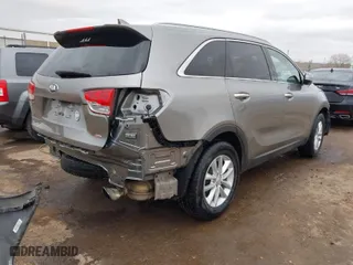 2018 Kia Sorento L with VIN 5XYPG4A35JG399820, listed as a IAAI auction lot 41840845 with 134,409 mi miles. Bid and sale history available at carsss.com. Image 4.