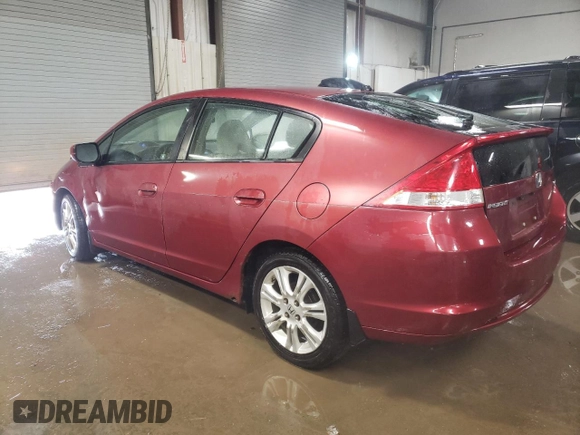 2010 Honda Insight LX with VIN JHMZE2H52AS034613, listed as a Copart auction lot 52701795 with 232,541 mi miles and Salvage Title. Bid and sale history available at DreamBid. Image 2.