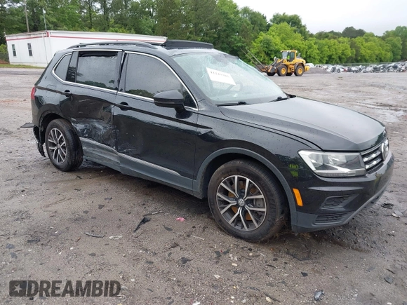 2021 Volkswagen Tiguan SE with VIN 3VV3B7AX6MM021502, listed as a IAAI auction lot 42243705 with 60,988 mi miles and . Bid and sale history available at DreamBid. Image 1.