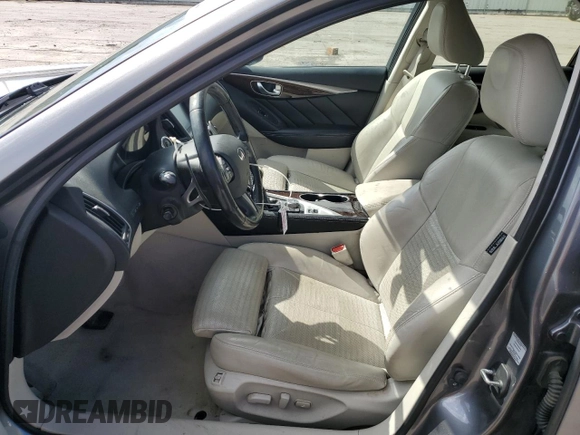 2015 Infiniti Q50 Premium with VIN JN1BV7AR7FM392009, listed as a Copart auction lot 55526505 with 110,884 mi miles and Salvage title. Bid and sale history available at DreamBid. Image 7.