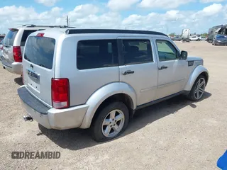 2008 Dodge Nitro SLT with VIN 1D8GT58KX8W100870, listed as a IAAI auction lot 42520804 with 167,043 mi miles and . Bid and sale history available at DreamBid. Image 4.
