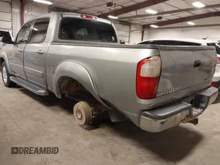 2004 Toyota Tundra SR5 with VIN 5TBDT44104S441271, listed as a IAAI auction lot 41823831 with 296,637 mi miles and . Bid and sale history available at DreamBid. Image 3.