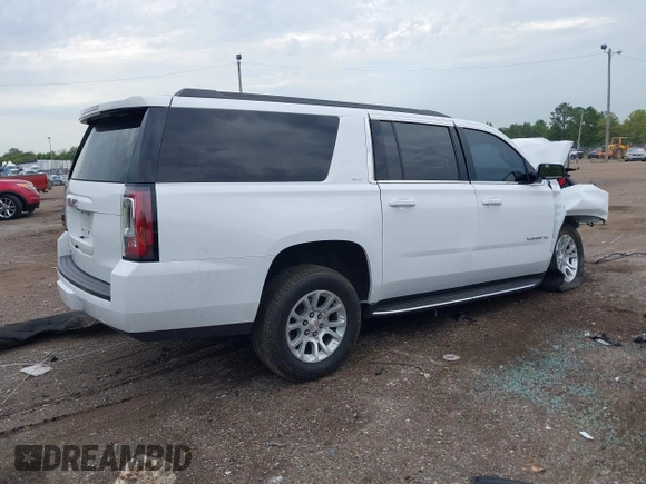 2019 GMC Yukon XL SLT with VIN 1GKS2GKC2KR369285, listed as a IAAI auction lot 40279008 with Not Provided miles and . Bid and sale history available at DreamBid. Image 4.