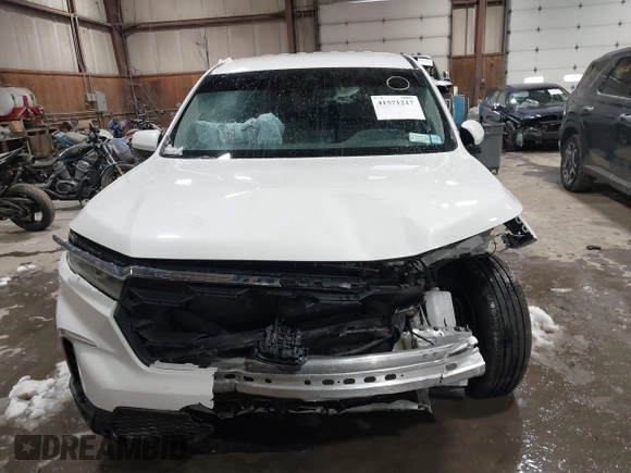 2025 Honda Pilot EX-L with VIN 5FNYG1H41SB045061, listed as a IAAI auction lot 41571217 with 7,971 mi miles and . Bid and sale history available at DreamBid. Image 12.