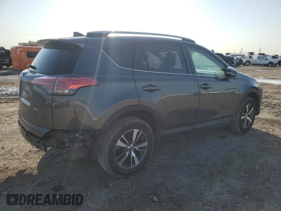 2018 Toyota RAV4 XLE with VIN 2T3WFREV0JW517488, listed as a Copart auction lot 51000975 with 68,105 mi miles and Salvage title. Bid and sale history available at DreamBid. Image 3.