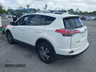2016 Toyota RAV4 LE with VIN JTMZFREV2GJ096782, listed as a IAAI auction lot 41945319 with 76,866 mi miles. Bid and sale history available at carsss.com. Image 3.