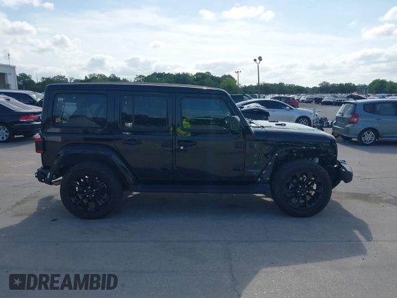2022 Jeep Wrangler Unlimited Sahara with VIN 1C4JJXP60NW153776, listed as a IAAI auction lot 42108916 with 39,123 mi miles and . Bid and sale history available at DreamBid. Image 14.