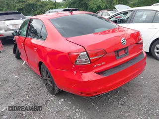 2015 Volkswagen Jetta SE with VIN 3VWD17AJ8FM332771, listed as a IAAI auction lot 42371867 with 196,198 mi miles and . Bid and sale history available at DreamBid. Image 3.