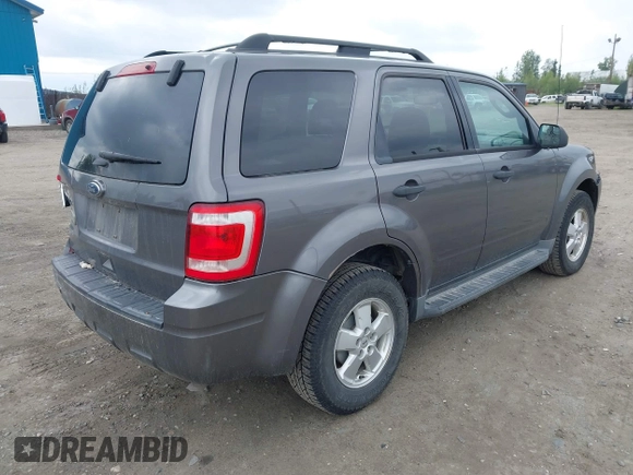 2011 Ford Escape XLT z VIN 1FMCU9D73BKA87277, wystawiony jako IAAI lot #42662242 z przebiegiem 207 649 mil mil oraz . Historia ofert i sprzedaży dostępna na DreamBid. Obrazek 4.
