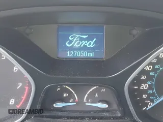 2012 Ford Focus SE with VIN 1FAHP3F26CL220986, listed as a IAAI auction lot 41719127 with 127,050 mi miles and . Bid and sale history available at DreamBid. Image 7.
