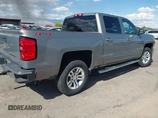 2017 Chevrolet Silverado 1500 LT with VIN 3GCUKREC2HG173402, listed as a IAAI auction lot 42041848 with 40,358 mi miles and . Bid and sale history available at DreamBid. Image 4.