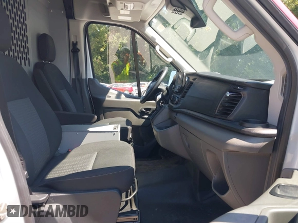 2020 Ford Transit Cargo with VIN 1FTBW3X8XLKB01219, listed as a IAAI auction lot 40268320 with 53,863 mi miles and . Bid and sale history available at DreamBid. Image 5.