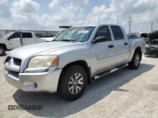2007 Mitsubishi Raider LS z VIN 1Z7HC28KX7S126249, wystawiony jako Copart lot #63955484 z przebiegiem 176 786 mil mil oraz Szkoda całkowita • Salvage title. Historia ofert i sprzedaży dostępna na DreamBid. Obrazek 1.