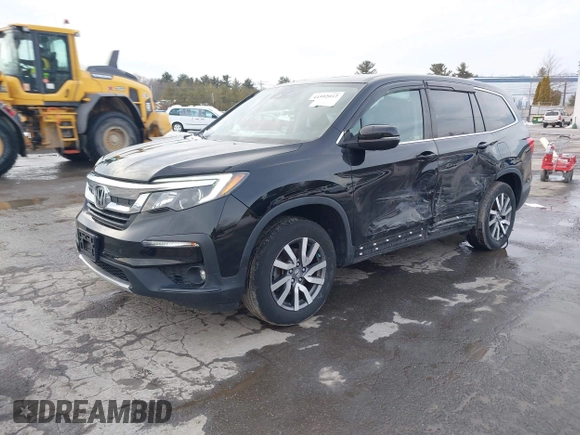 2020 Honda Pilot EX-L z VIN 5FNYF6H50LB022798, wystawiony jako IAAI lot #41592012 z przebiegiem 67 045 mil mil oraz . Historia ofert i sprzedaży dostępna na DreamBid. Obrazek 17.