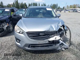 2016 Mazda CX-5 Grand Touring with VIN JM3KE4DYXG0647802, listed as a IAAI auction lot 41996854 with 85,774 mi miles. Bid and sale history available at carsss.com. Image 12.