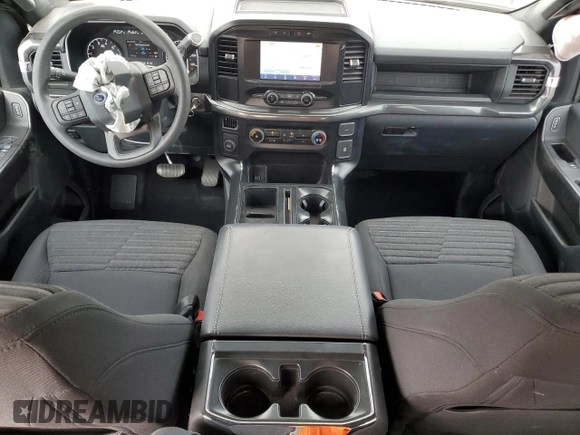 2023 Ford F-150 XL with VIN 1FTEW1CP4PKF86851, listed as a Copart auction lot 50611185 with 15,773 mi miles and Salvage Title. Bid and sale history available at DreamBid. Image 8.