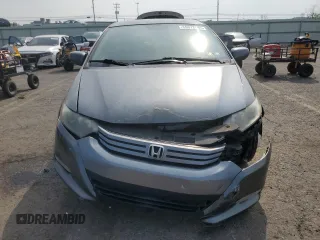 2011 Honda Insight с VIN JHMZE2H3XBS008258, выставлен на аукционе Copart как лот 59378995 с пробегом 196 184 миль миль и Списание • Salvage title. История ставок и продаж доступна на DreamBid. Изображение 5.