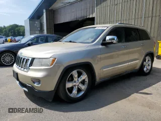 2011 Jeep Grand Cherokee Overland Summit with VIN 1J4RR6GT6BC737277, listed as a Copart auction lot 65777315 with 177,605 mi miles and Clean title. Bid and sale history available at DreamBid. Image 1.