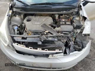 2013 Kia Rio LX z VIN KNADM4A35D6280066, wystawiony jako Copart lot #57293585 z przebiegiem 129 281 mil mil oraz Szkoda całkowita • Salvage title. Historia ofert i sprzedaży dostępna na DreamBid. Obrazek 11.