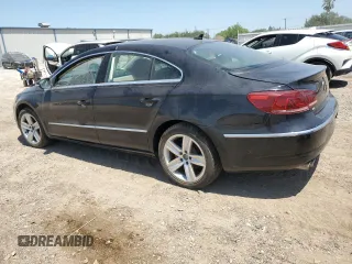 2013 Volkswagen CC R-Line z VIN WVWBN7AN3DE512289, wystawiony jako Copart lot #51865735 z przebiegiem 69 799 mil mil oraz Szkoda całkowita • Salvage title. Historia ofert i sprzedaży dostępna na DreamBid. Obrazek 2.