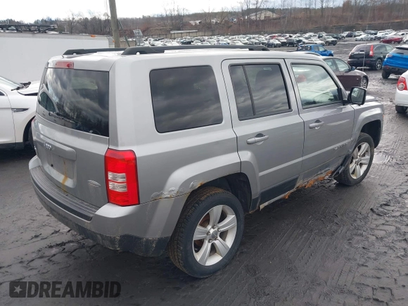 2014 Jeep Patriot Latitude with VIN 1C4NJRFB6ED778433, listed as a IAAI auction lot 41211522 with 127,506 mi miles. Bid and sale history available at carsss.com. Image 4.
