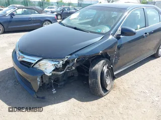 2012 Toyota Camry L with VIN 4T1BF1FK0CU599819, listed as a IAAI auction lot 42158719 with 130,038 mi miles. Bid and sale history available at carsss.com. Image 6.