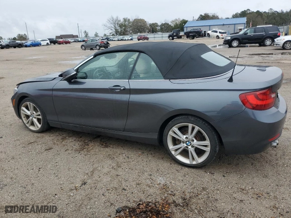 2015 BMW 2 Series 228i with VIN WBA1K5C57FV474037, listed as a Copart auction lot 87857635 with 91,333 mi miles and Salvage Title. Bid and sale history available at carsss.com. Image 2.