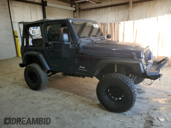 2006 Jeep Wrangler SE with VIN 1J4FA29126P705827, listed as a Copart auction lot 82226674 with 165,632 mi miles and Salvage Title. Bid and sale history available at carsss.com. Image 4.