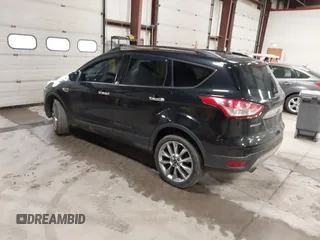 2015 Ford Escape SE with VIN 1FMCU9G9XFUA70029, listed as a IAAI auction lot 41673827 with 82,043 mi miles. Bid and sale history available at carsss.com. Image 3.
