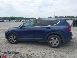 2021 Hyundai Santa Fe SE with VIN 5NMS14AJ2MH323542, listed as a IAAI auction lot 42182576 with 69,385 mi miles and . Bid and sale history available at DreamBid. Image 14.