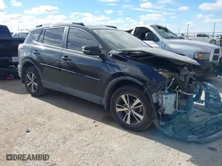 2017 Toyota RAV4 XLE with VIN 2T3RFREV9HW567801, listed as a IAAI auction lot 41053316 with 103,267 mi miles. Bid and sale history available at carsss.com. Image 1.