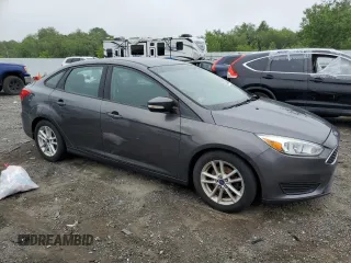 2015 Ford Focus SE with VIN 1FADP3F22FL285353, listed as a Copart auction lot 60443685 with 149,878 mi miles and Clean title. Bid and sale history available at DreamBid. Image 4.
