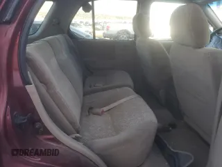 2002 Isuzu Rodeo S with VIN 4S2DM58W824313096, listed as a Copart auction lot 77951364 with 127,470 mi miles and Salvage Title. Bid and sale history available at DreamBid. Image 11.