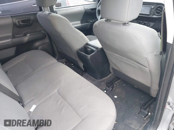 2017 Toyota Tacoma SR with VIN 5TFAX5GN6HX083614, listed as a IAAI auction lot 42314254 with 104,407 mi miles and . Bid and sale history available at DreamBid. Image 8.