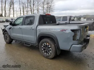 2023 Nissan Frontier PRO-4X with VIN 1N6ED1EK9PN622424, listed as a Copart auction lot 88164565 with 23,212 mi miles and Salvage Title. Bid and sale history available at carsss.com. Image 2.