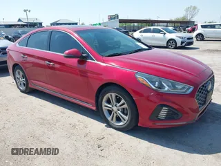 2018 Hyundai Sonata SEL z VIN 5NPE34AF4JH657119, wystawiony jako IAAI lot #41960829 z przebiegiem 81 305 mil mil oraz . Historia ofert i sprzedaży dostępna na DreamBid. Obrazek 1.