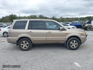 2006 Honda Pilot EX-L with VIN 5FNYF28566B010295, listed as a IAAI auction lot 41654433 with 302,539 mi miles. Bid and sale history available at carsss.com. Image 13.