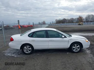 2002 Ford Taurus SES Standard with VIN 1FAFP55U12A184513, listed as a IAAI auction lot 41125306 with 241,896 mi miles. Bid and sale history available at carsss.com. Image 13.