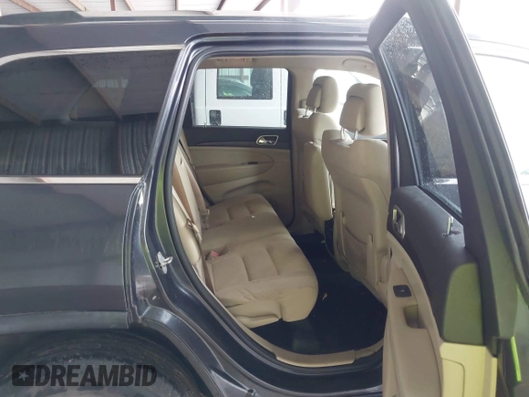 2014 Jeep Grand Cherokee Laredo with VIN 1C4RJEAG6EC206748, listed as a IAAI auction lot 42244421 with 198,217 mi miles and . Bid and sale history available at DreamBid. Image 8.