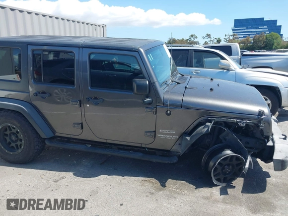 2016 Jeep Wrangler Unlimited Sport z VIN 1C4BJWDG7GL229364, wystawiony jako IAAI lot #42239069 z przebiegiem 87 001 mil mil oraz . Historia ofert i sprzedaży dostępna na DreamBid. Obrazek 13.