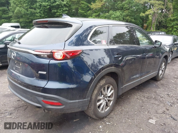 2019 Mazda CX-9 Touring with VIN JM3TCBCY6K0334898, listed as a IAAI auction lot 42467677 with 69,454 mi miles and . Bid and sale history available at DreamBid. Image 4.