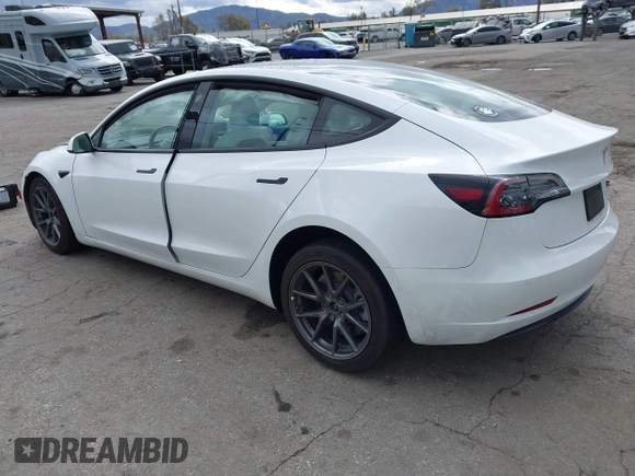 2021 Tesla Model 3 Long Range with VIN 5YJ3E1EB8MF860282, listed as a IAAI auction lot 41787008 with 49,730 mi miles and . Bid and sale history available at DreamBid. Image 3.